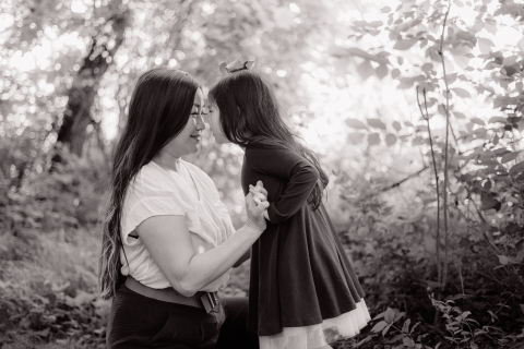 A photographer in Potomac, MD took a picture of a mother and daughter leaning in close to each other, touching noses.